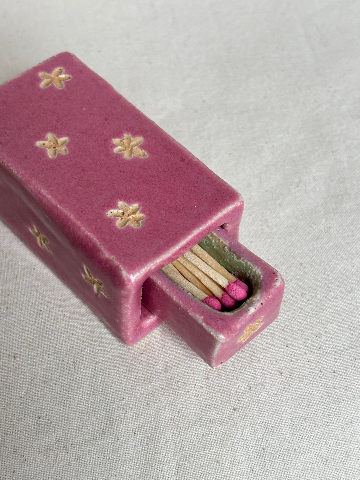 Pink match box with flower detailing