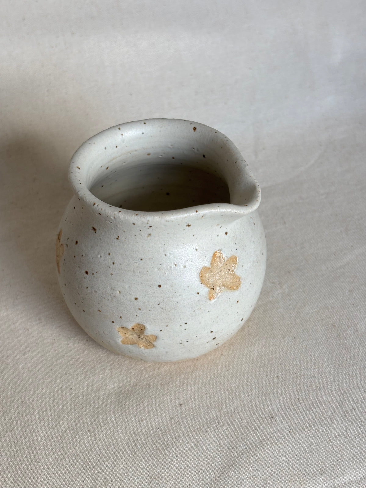 Small mulk jug - beige with flower detail