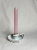 Candlestick holder in snow