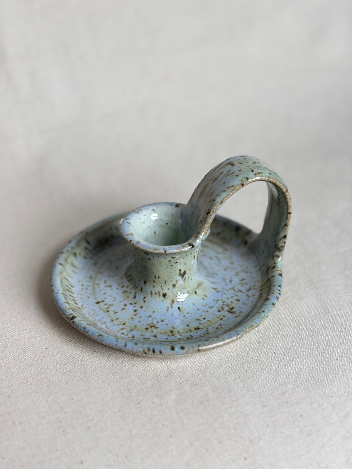Blue speckled candle holder