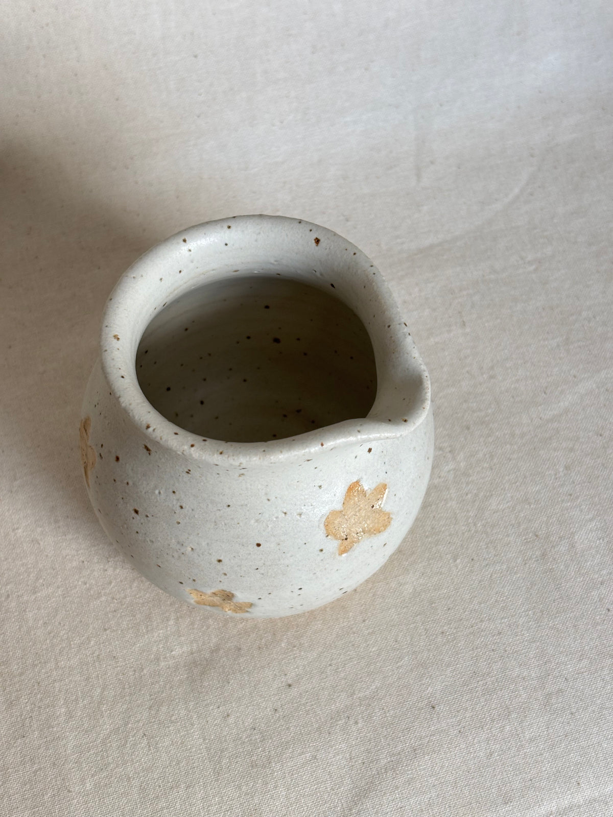 Small mulk jug - beige with flower detail