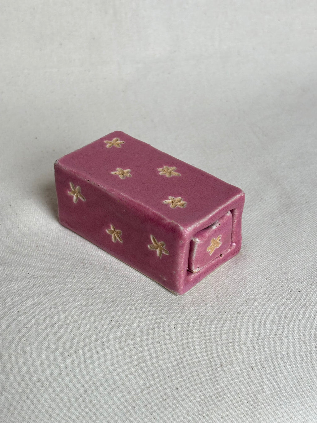 Pink match box with flower detailing