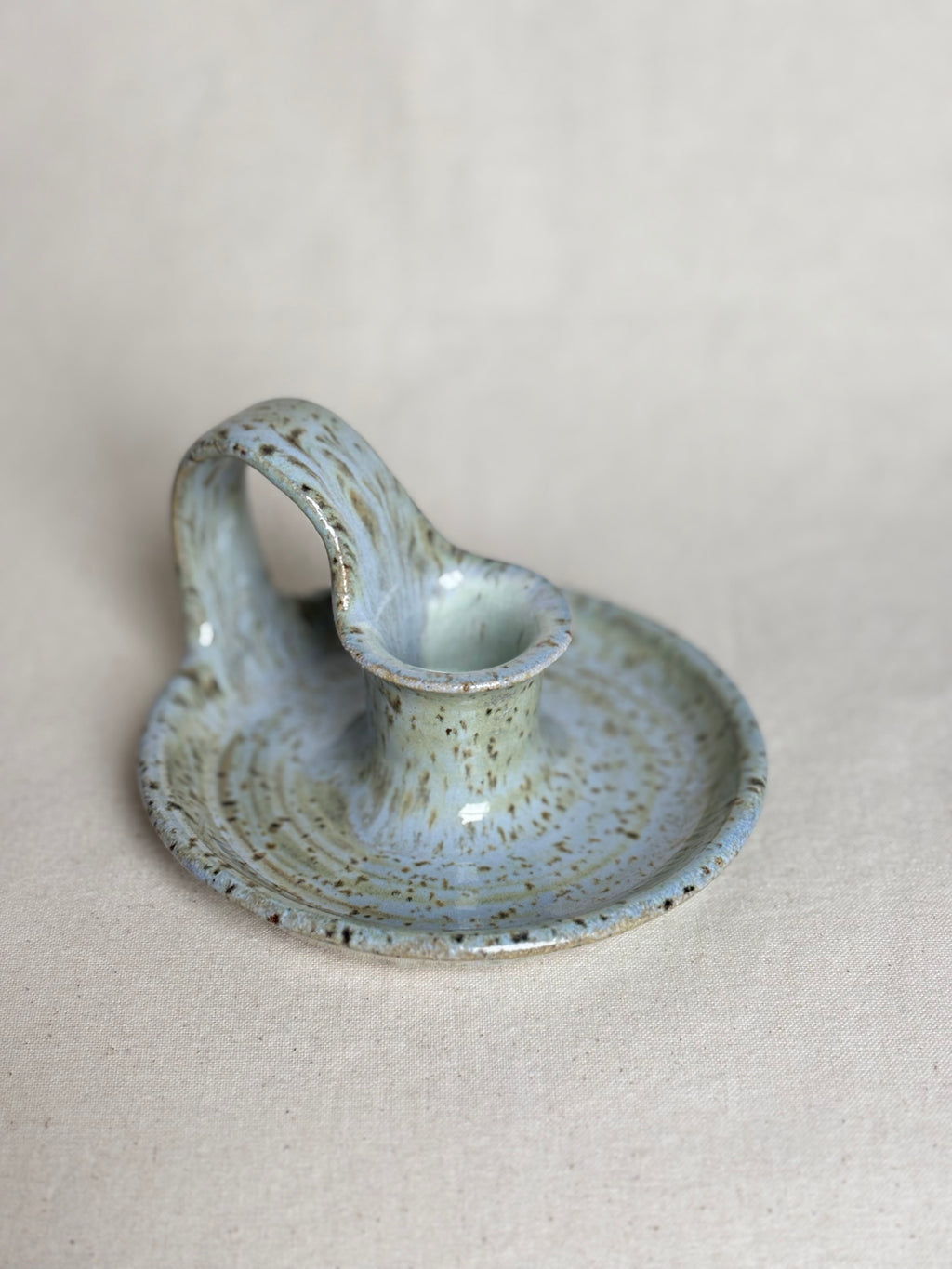 Blue speckled candle holder