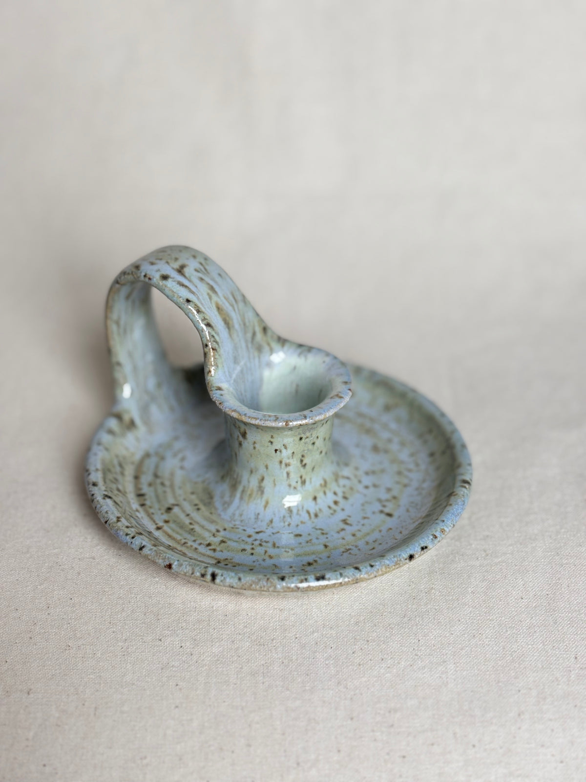 Blue speckled candle holder