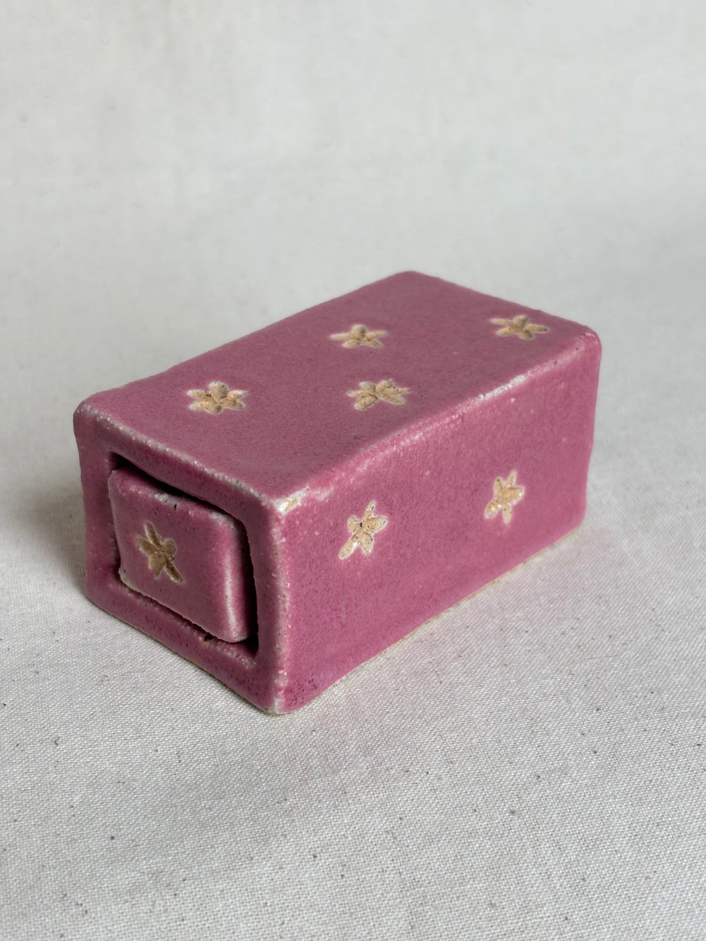 Pink match box with flower detailing