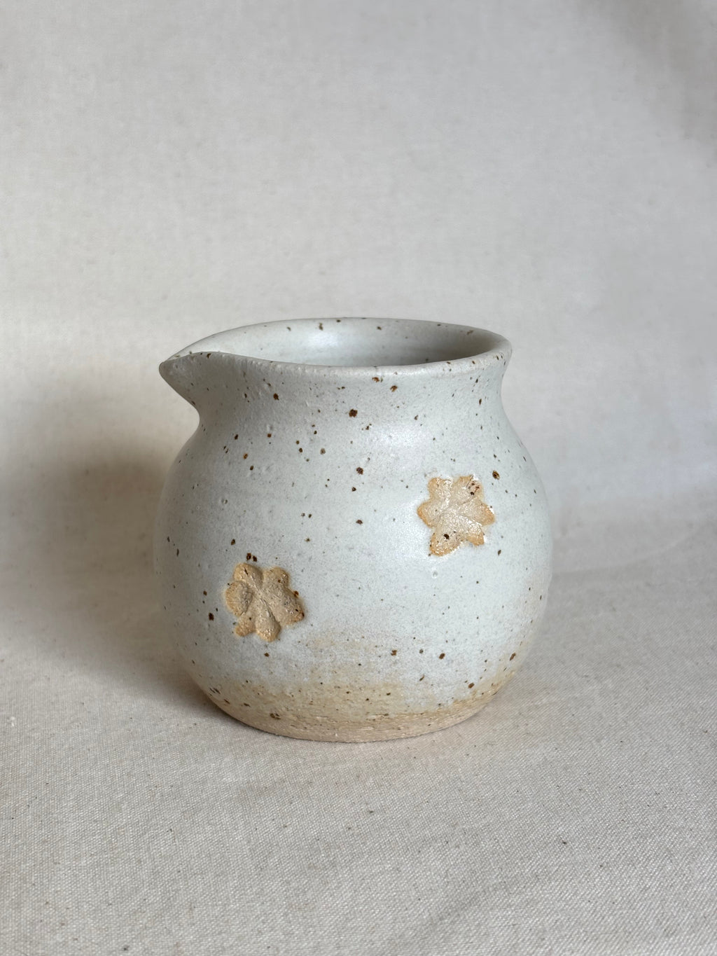Small mulk jug - beige with flower detail