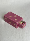 Pink match box with flower detailing